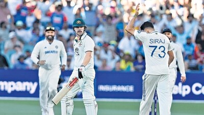 India's Mohammed Siraj, right, celebrates after the dismissal of Australia's Travis Head, centre, during the day two of the second cricket test match between Australia and India at the Adelaide Oval in Adelaide, on Saturday. (AP) India's Mohammed Siraj, right, celebrates after the dismissal of Australia's Travis Head, centre, during the day two of the second cricket test match between Australia and India at the Adelaide Oval in Adelaide, on Saturday. (AP)