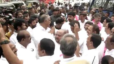 Later, the BRS MLAs were taken away by police in vehicles. (ANI screengrab) Later, the BRS MLAs were taken away by police in vehicles. (ANI screengrab)