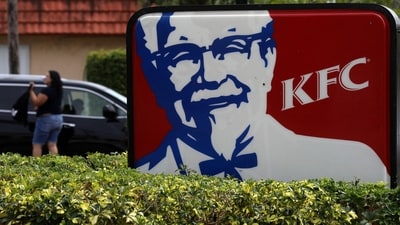 A Kentucky Fried Chicken (KFC) logo is pictured on a sign in North Miami Beach, Florida, U.S. April 6, 2017. (REUTERS / Carlo Allegri)