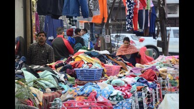Residents check out woollens amid plunge in temperature in Ludhiana. (Gurpreet Singh/HT)