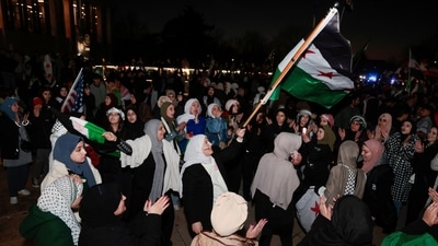 Syrian-Americans and supporters celebrate after Syrian rebels announced that they had ousted Syrian President Bashar al-Assad in Syria, in Dearborn, Michigan, U.S. December 8, 2024.    REUTERS (REUTERS)