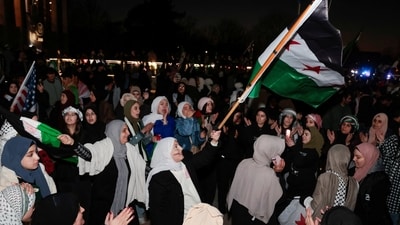 Syrian-Americans and supporters celebrate after Syrian rebels announced that they had ousted Syrian President Bashar al-Assad in Syria, in Dearborn, Michigan, U.S. December 8, 2024.    REUTERS (REUTERS)
