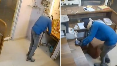 In a CCTV video, the masked man is captured entering the petrol pump office with calculated stealth. (X/WebduniaHindi) In a CCTV video, the masked man is captured entering the petrol pump office with calculated stealth. (X/WebduniaHindi)