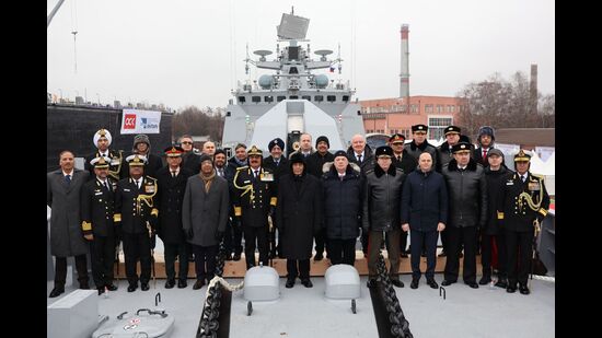 Defence minister Rajnath Singh posing for photographs with the Russian delegation during the commissioning ceremony of India's latest multi-role stealth guided missile frigate INS Tushil, in the Baltic port of Kaliningrad. (AFP)