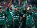 Pakistan's captain Mohammad Rizwan touches his forehead after getting hurt. (AP Photo/Rick Rycroft)