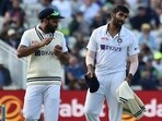 India's Jasprit Bumrah (R) interacts with teammate Mohammed Shami India's Jasprit Bumrah (R) interacts with teammate Mohammed Shami