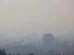 Buildings are enveloped in smog following the increase in air pollution in Tehran, Iran 