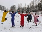 Manali: Tourists pose in the snow after fresh snowfall in Solang Valley, in Manali, Himachal Pradesh on Monday. Manali: Tourists pose in the snow after fresh snowfall in Solang Valley, in Manali, Himachal Pradesh on Monday.
