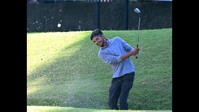 A player in action during the All India Amateur Golf Championship at the Chandigarh Golf Club on Tuesday. (Keshav Singh/HT)