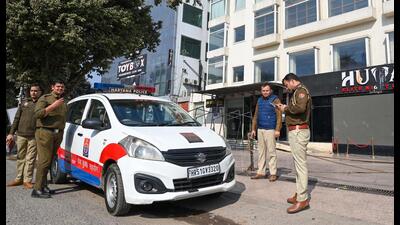 A team of the National Investigation Agency (NIA) and Gurugram Police at the spot where a crude bomb was thrown outside a club in Sector 29 early on Tuesday morning. (Parveen Kumar/HT PHOTO) A team of the National Investigation Agency (NIA) and Gurugram Police at the spot where a crude bomb was thrown outside a club in Sector 29 early on Tuesday morning. (Parveen Kumar/HT PHOTO)