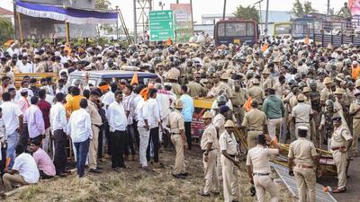 Belagavi: Police stop protestors who tried to barge into Suvarna Vidhana Soudha during their protest demanding quota for the Panchamasali Lingayat community, in Belagavi, Tuesday (PTI) Belagavi: Police stop protestors who tried to barge into Suvarna Vidhana Soudha during their protest demanding quota for the Panchamasali Lingayat community, in Belagavi, Tuesday (PTI)