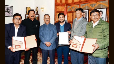 Director of transport department DC Negi signed the MoU on behalf of the state government, with Rahul Soni representing EVI Technology and Avinash Sharma representing Jio-BP, in the presence of chief minister (CM) Sukhvinder Singh Sukhu in Shimla on Tuesday. (HT Photo) Director of transport department DC Negi signed the MoU on behalf of the state government, with Rahul Soni representing EVI Technology and Avinash Sharma representing Jio-BP, in the presence of chief minister (CM) Sukhvinder Singh Sukhu in Shimla on Tuesday. (HT Photo)