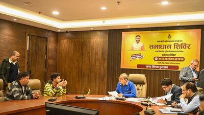 MCG commissioner Ashok Kumar Garg with officials at the grievance redressal camp at MCG office in Sector 34 on Monday. (Parveen Kumar/HT Photo) MCG commissioner Ashok Kumar Garg with officials at the grievance redressal camp at MCG office in Sector 34 on Monday. (Parveen Kumar/HT Photo)