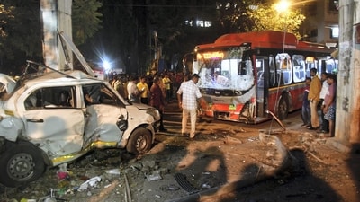 Mumbai: People gather near the wreckage of vehicles after a Brihanmumbai Electric Supply and Transport (BEST) undertaking's bus rammed into pedestrians as well as vehicles on a road at Kurla, in Mumbai. (PTI) Mumbai: People gather near the wreckage of vehicles after a Brihanmumbai Electric Supply and Transport (BEST) undertaking's bus rammed into pedestrians as well as vehicles on a road at Kurla, in Mumbai. (PTI)