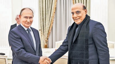 Russian President Vladimir Putin shakes hands with Indian Defence Minister Rajnath Singh during a meeting in Moscow. (via REUTERS) Russian President Vladimir Putin shakes hands with Indian Defence Minister Rajnath Singh during a meeting in Moscow. (via REUTERS)