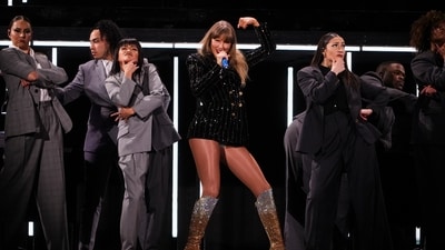 Taylor Swift performed with her team during The Eras Tour in Vancouver. (AP)