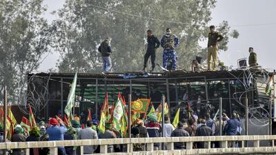 The protesting farmers had to suspend their foot march to Delhi from the Shambhu border on Sunday after some of them sustained injuries in tear gas shelling by Haryana security personnel, who once again thwarted an attempt by the protesters to go past the Punjab-Haryana border. (PTI) The protesting farmers had to suspend their foot march to Delhi from the Shambhu border on Sunday after some of them sustained injuries in tear gas shelling by Haryana security personnel, who once again thwarted an attempt by the protesters to go past the Punjab-Haryana border. (PTI)