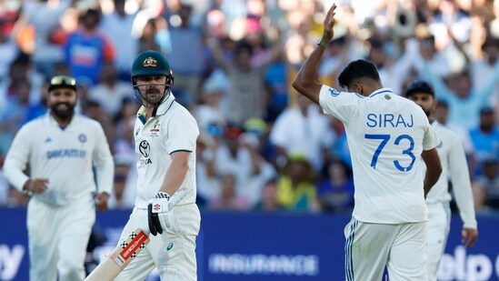 India's Mohammed Siraj, right, celebrates after the dismissal of Australia's Travis Head. AP/PTI(AP12_07_2024_000130B) (AP)