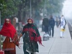 Commuters brave the morning chill and fog at Dwarka , in New Delhi, India, on Sunday. Commuters brave the morning chill and fog at Dwarka , in New Delhi, India, on Sunday.