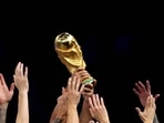 Argentina players celebrate with the trophy after winning the World Cup in 2022