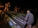 Turkish-backed Syrian fighters preparing rockets to be fired towards areas in northeastern Syria controlled by the Kurdish-led Syrian Democratic Forces (SDF). Turkish-backed Syrian fighters preparing rockets to be fired towards areas in northeastern Syria controlled by the Kurdish-led Syrian Democratic Forces (SDF).