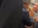Screengrab from viral video of passengers cornering the alleged would-be hijacker (x.com/MarioNawfal) Screengrab from viral video of passengers cornering the alleged would-be hijacker (x.com/MarioNawfal)