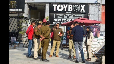 A team of the National Investigation Agency (NIA) and Gurugram Police at the spot where a crude bomb was thrown outside a club in Sector-29 on Tuesday. (HT PHOTO) A team of the National Investigation Agency (NIA) and Gurugram Police at the spot where a crude bomb was thrown outside a club in Sector-29 on Tuesday. (HT PHOTO)