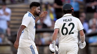 Indian bowler Mohammed Siraj (L) gestures to Australian batsman Travis Head (R) on the second day of the Adelaide Test (AFP) Indian bowler Mohammed Siraj (L) gestures to Australian batsman Travis Head (R) on the second day of the Adelaide Test (AFP)