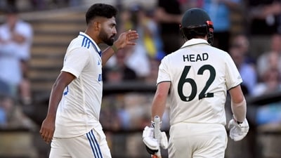 Mohammed Siraj (L) gestures to Travis Head (AFP)
