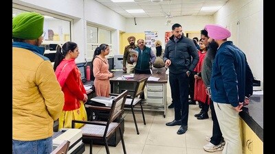 Deputy commissioner Jitendra Jorwal during a surprise check in an office in Ludhiana on Wednesday. (HT photo)