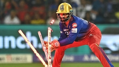 Dinesh Karthik was appointed RCB mentor after he announces his retirement from IPL. (AFP) Dinesh Karthik was appointed RCB mentor after he announces his retirement from IPL. (AFP)