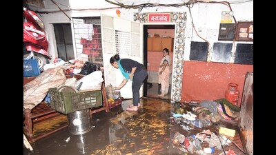 The residents of Ekta Nagari on Sinhagad Road, who face frequent flooding during monsoon, will soon be rehabilitated. (HT FILE)