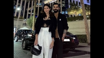 Anushka and Virat won the style game in this another date night look. The actor made heads turn in a black bodysuit featuring sheer detailing. She paired it with white flared pants, a cropped black jacket, and a mini handbag. Meanwhile, Virat complemented her in a black coat, brown Polo shirt, and black pants. Anushka and Virat won the style game in this another date night look. The actor made heads turn in a black bodysuit featuring sheer detailing. She paired it with white flared pants, a cropped black jacket, and a mini handbag. Meanwhile, Virat complemented her in a black coat, brown Polo shirt, and black pants. 