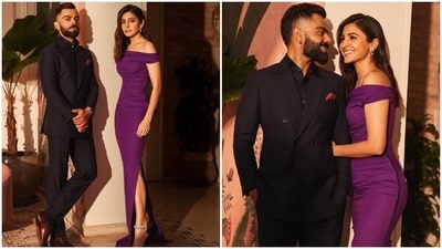The couple brought their fashion A-game for a red carpet event. Anushka looked captivating in a purple off-the-shoulder, floor-length gown featuring a side knee-high slit. Meanwhile, Virat complemented her in a black double-breasted blazer, matching button-down shirt, tapered-fit pants, and a red pocket square. The couple brought their fashion A-game for a red carpet event. Anushka looked captivating in a purple off-the-shoulder, floor-length gown featuring a side knee-high slit. Meanwhile, Virat complemented her in a black double-breasted blazer, matching button-down shirt, tapered-fit pants, and a red pocket square. 