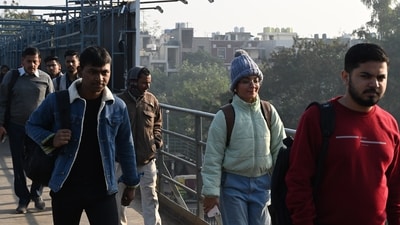 Commuters layered up against the cold at Akshardham, Delhi, on Tuesday. Cold wave conditions are expected in Rajasthan, Punjab, Haryana, Chandigarh, and Madhya Pradesh from Wednesday to Friday, while West Uttar Pradesh will feel the chill until Thursday. (Arvind Yadav/HT Photo) Commuters layered up against the cold at Akshardham, Delhi, on Tuesday. Cold wave conditions are expected in Rajasthan, Punjab, Haryana, Chandigarh, and Madhya Pradesh from Wednesday to Friday, while West Uttar Pradesh will feel the chill until Thursday. (Arvind Yadav/HT Photo)