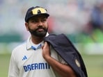India's captain Rohit Sharma walks off the field