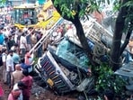 People gather near the accident spot in Palakkad district, Kerala. (PTI PHOTO)