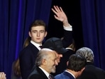 Republican presidential nominee and former U.S. President Donald Trump's son Barron Trump waves during Trump rally following early results from the 2024 U.S. presidential election in Palm Beach County Convention Center, in West Palm Beach, Florida, U.S., November 6, 2024