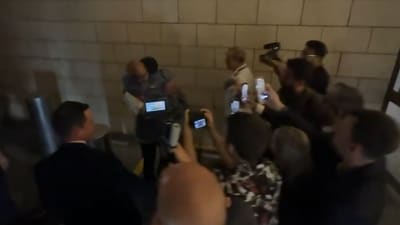 D Gukesh hugs his father. D Gukesh hugs his father.