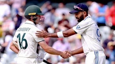 India's Jasprit Bumrah (R) shakes hands with Australia's Nathan McSweeney (AFP) India's Jasprit Bumrah (R) shakes hands with Australia's Nathan McSweeney (AFP)