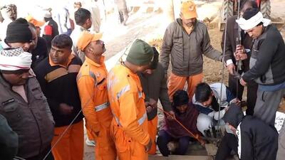 Rescue workers trying to pull out the boy who fell into a borewell in Rajasthan (PTI) Rescue workers trying to pull out the boy who fell into a borewell in Rajasthan (PTI)