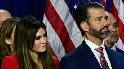 Kimberly Guilfoyle and her partner Donald Trump Jr. listen to former US President and Republican presidential candidate Donald Trump speak an election night event at the West Palm Beach Convention Center in West Palm Beach, Florida, early on November 6, 2024. (AFP / Jim WATSON) Kimberly Guilfoyle and her partner Donald Trump Jr. listen to former US President and Republican presidential candidate Donald Trump speak an election night event at the West Palm Beach Convention Center in West Palm Beach, Florida, early on November 6, 2024. (AFP / Jim WATSON)