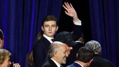 Republican presidential nominee and former U.S. President Donald Trump's son Barron Trump waves during Trump rally following early results from the 2024 U.S. presidential election in Palm Beach County Convention Center, in West Palm Beach, Florida, U.S., November 6, 2024 (REUTERS / Brendan McDermid)