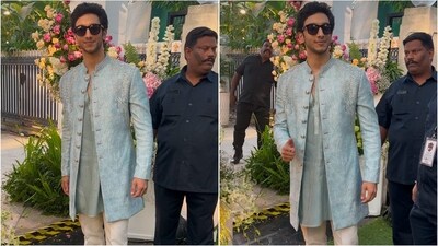 Vedang Raina looked dashing in a sky-blue bandh gala jacket adorned with intricate embroidery and golden buttons. Paired with beige pants and black sunglasses, he looked as handsome as ever. (Instagram ) Vedang Raina looked dashing in a sky-blue bandh gala jacket adorned with intricate embroidery and golden buttons. Paired with beige pants and black sunglasses, he looked as handsome as ever. (Instagram )