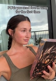Readers say Fourth Wing joins ACOTR in the spicy "romantasy" genre, with influencers like Angelina devouring the content. (TikTok / @angelinafrerk) Readers say Fourth Wing joins ACOTR in the spicy "romantasy" genre, with influencers like Angelina devouring the content. (TikTok / @angelinafrerk)