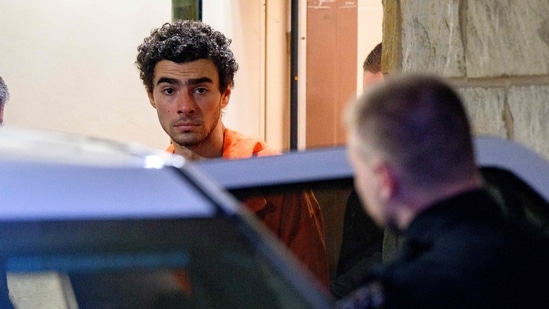 DECEMBER 10: Suspected shooter Luigi Mangione is led from the Blair County Courthouse after an extradition hearing December 10, 2024 in Hollidaysburg, Pennsylvania. (Getty Images via AFP / Jeff Swensen)