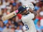 India's Nitish Kumar Reddy hits a six during the day one of the second cricket test match between Australia and India. India's Nitish Kumar Reddy hits a six during the day one of the second cricket test match between Australia and India.