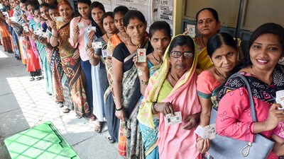 Women wait in queues to cast their vote for the Maharashtra Assembly Elections, in Akola. (Neeraj Bhange/ANI) Women wait in queues to cast their vote for the Maharashtra Assembly Elections, in Akola. (Neeraj Bhange/ANI)