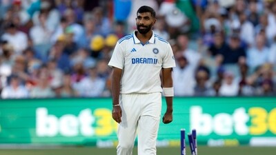 India's Jasprit Bumrah celebrates the dismissal of Australia's captain Pat Cummins. (AP Photo/James Elsby) (AP) India's Jasprit Bumrah celebrates the dismissal of Australia's captain Pat Cummins. (AP Photo/James Elsby) (AP)