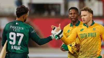 Pakistan's Haris Rauf (L) congratulates South Africa's George Linde (R) after South Africa won the first T20 international cricket match (AFP)